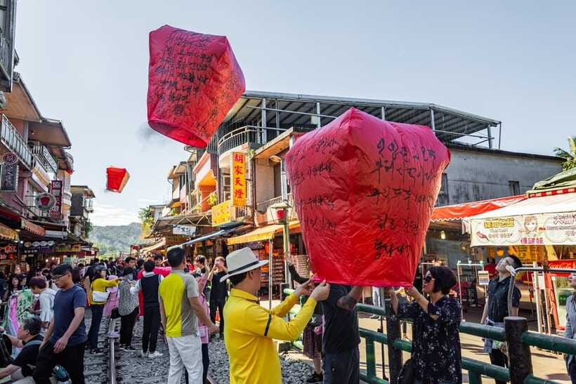 From Taipei: Shifen, Jiufen, and Yehliu Guided Day Trip - Jiufen Old Street, stairs, snacks, and tea-house views