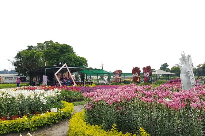 Private Day Tour to Sun Moon Lake from Taipei - Yidashao Pier, boats, and the busiest part of the day