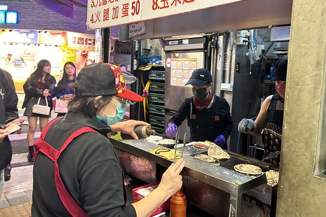 Taipei Hidden Eats, Market & Street Food Tour with 8+ Tastings - Ending with tofu pudding near Dongmen Station