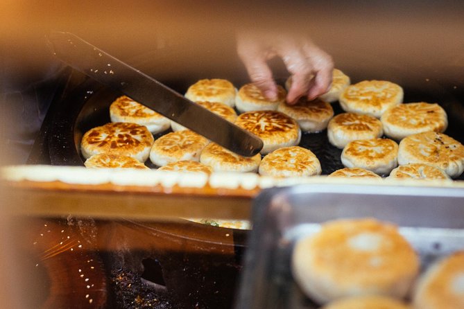 The Award-Winning Private Food Tour of Taipei: The 10 Tastings - Meeting at Dongmen Station and getting oriented